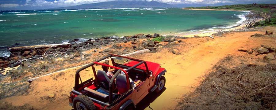 Red Jeep at beach
